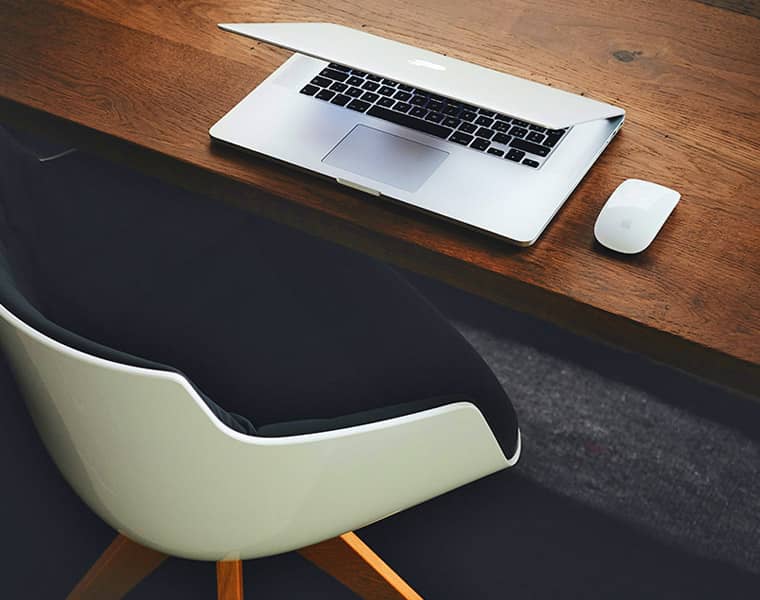 Office workstation with a computer and desk